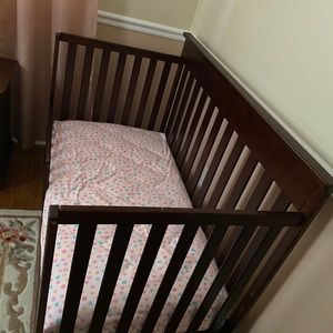 Crib with conversion kit and toddler rails
